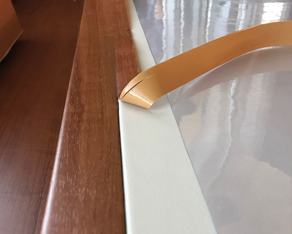 Wrapped yacht interior detail showing a smooth film-finished surface.